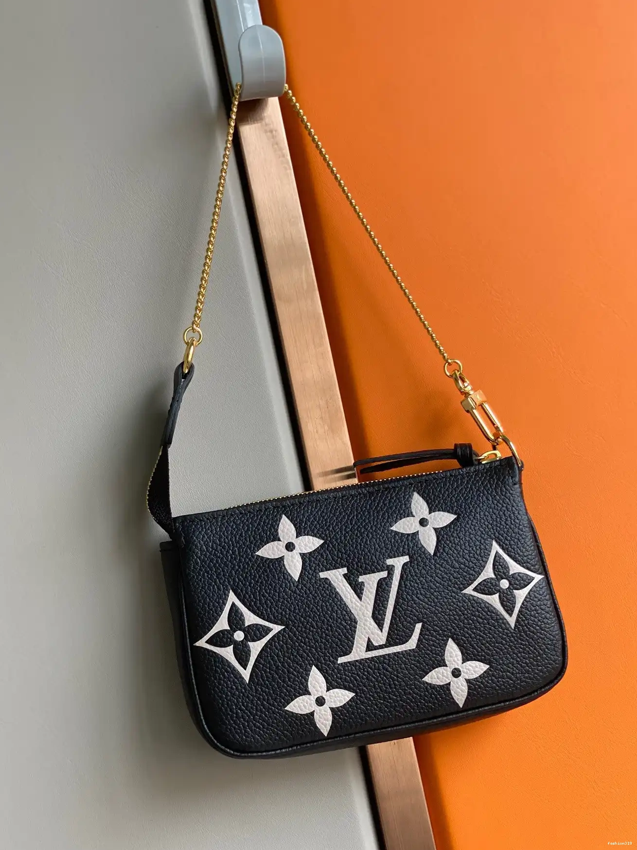 VUITTON POCHETTE ACCESSOIRES LOUIS MINI 0329